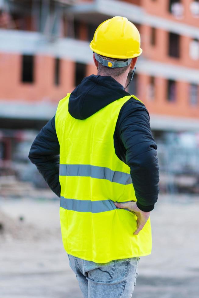 byggnadsarbetare ingenjör poserar foto