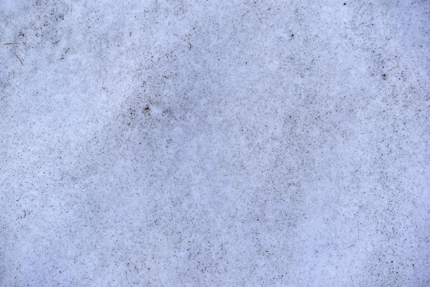 smutsig snö bakgrund närbild på våren foto