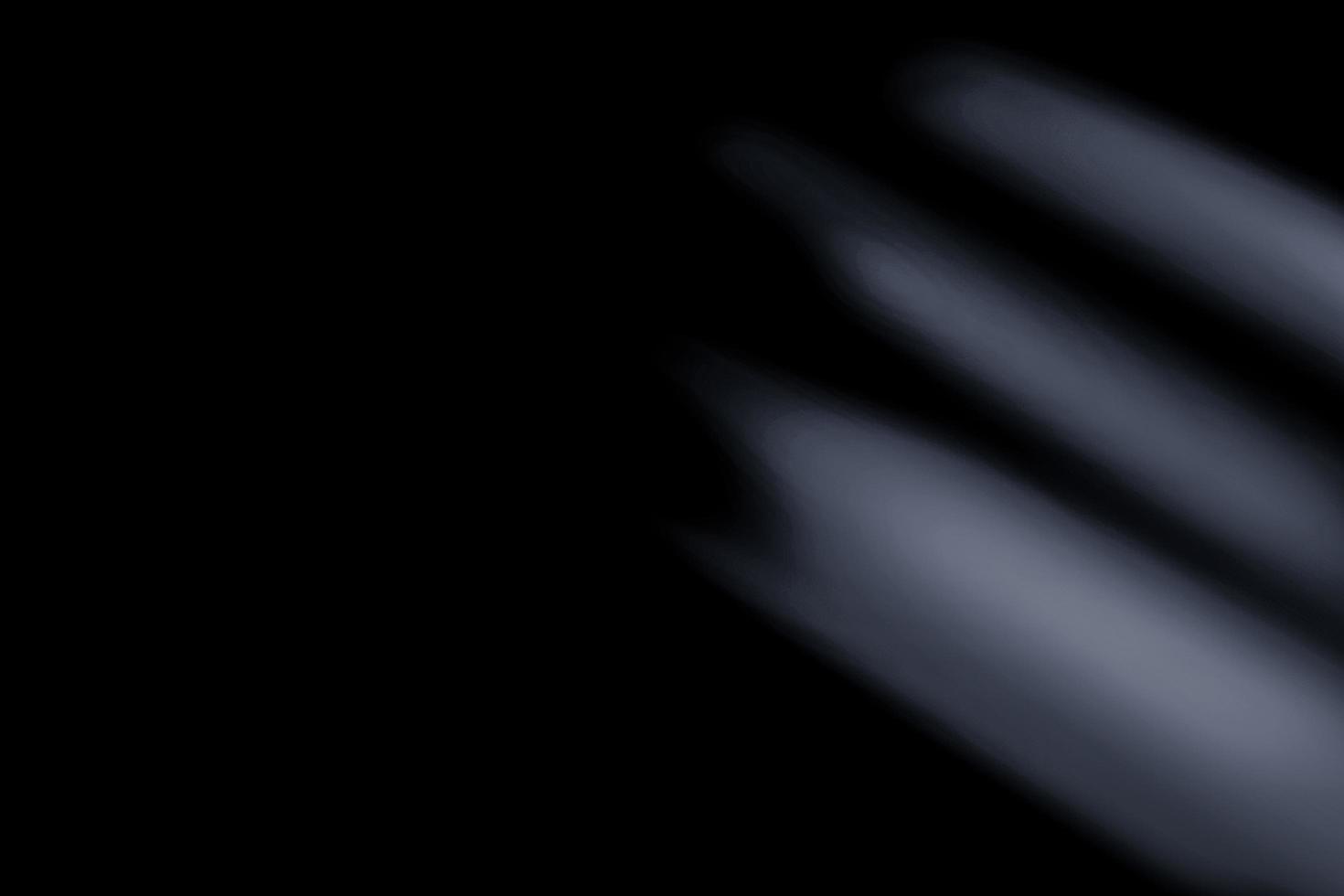 lins blossa och ljus läcka dis textur på en svart bakgrund. foto