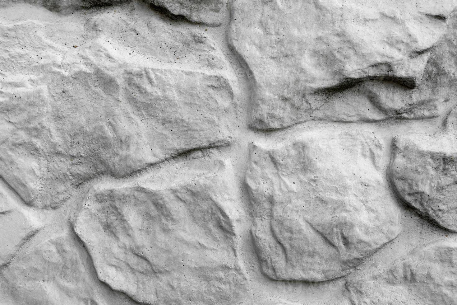 grå stenmur bakgrund. naturlig bakgrund. plats för text. foto