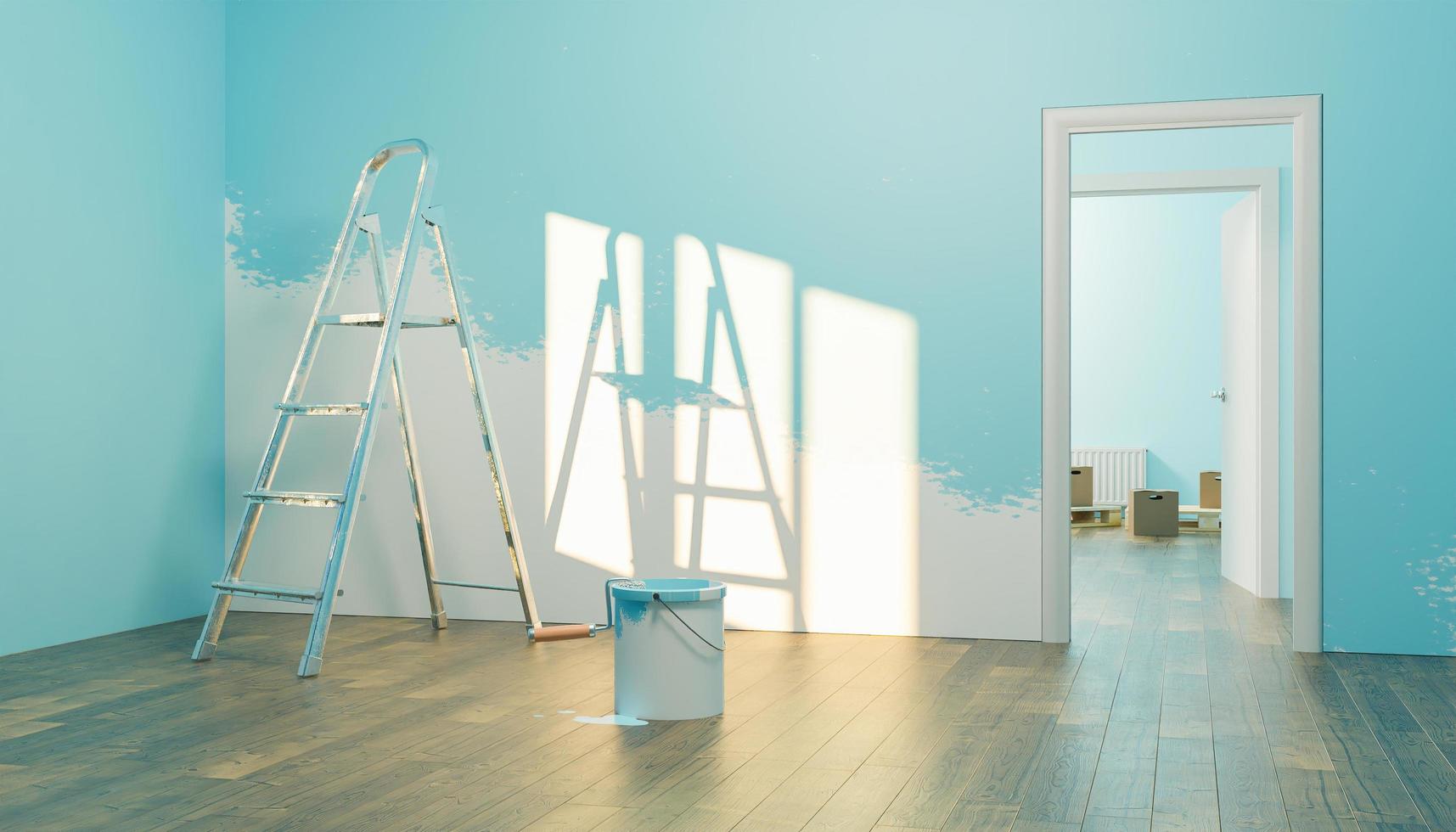 interiör i ett nytt hus med färgburk och halvmålad vägg foto