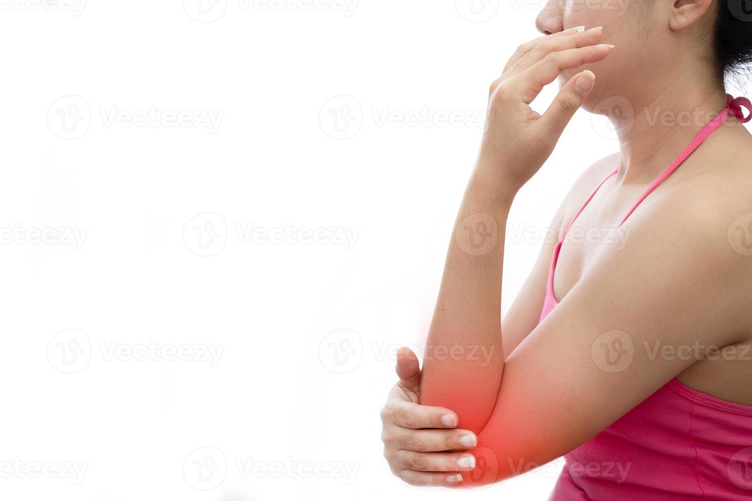 kvinna med armbågsskada foto