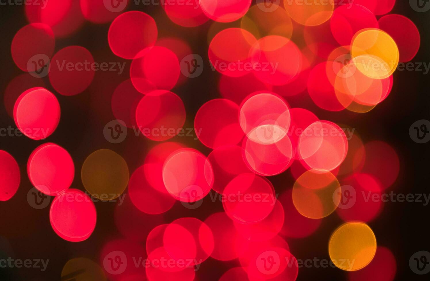 röd och gul ljus bokeh för jul foto