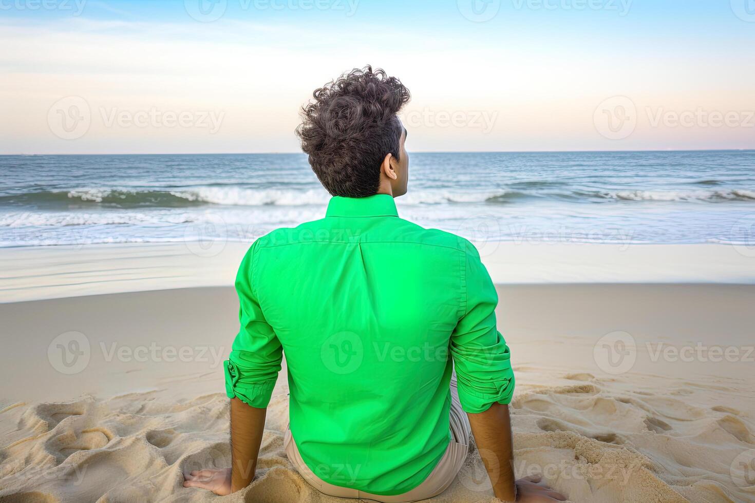 tillbaka se av en man Sammanträde på en strand. ai genererad foto