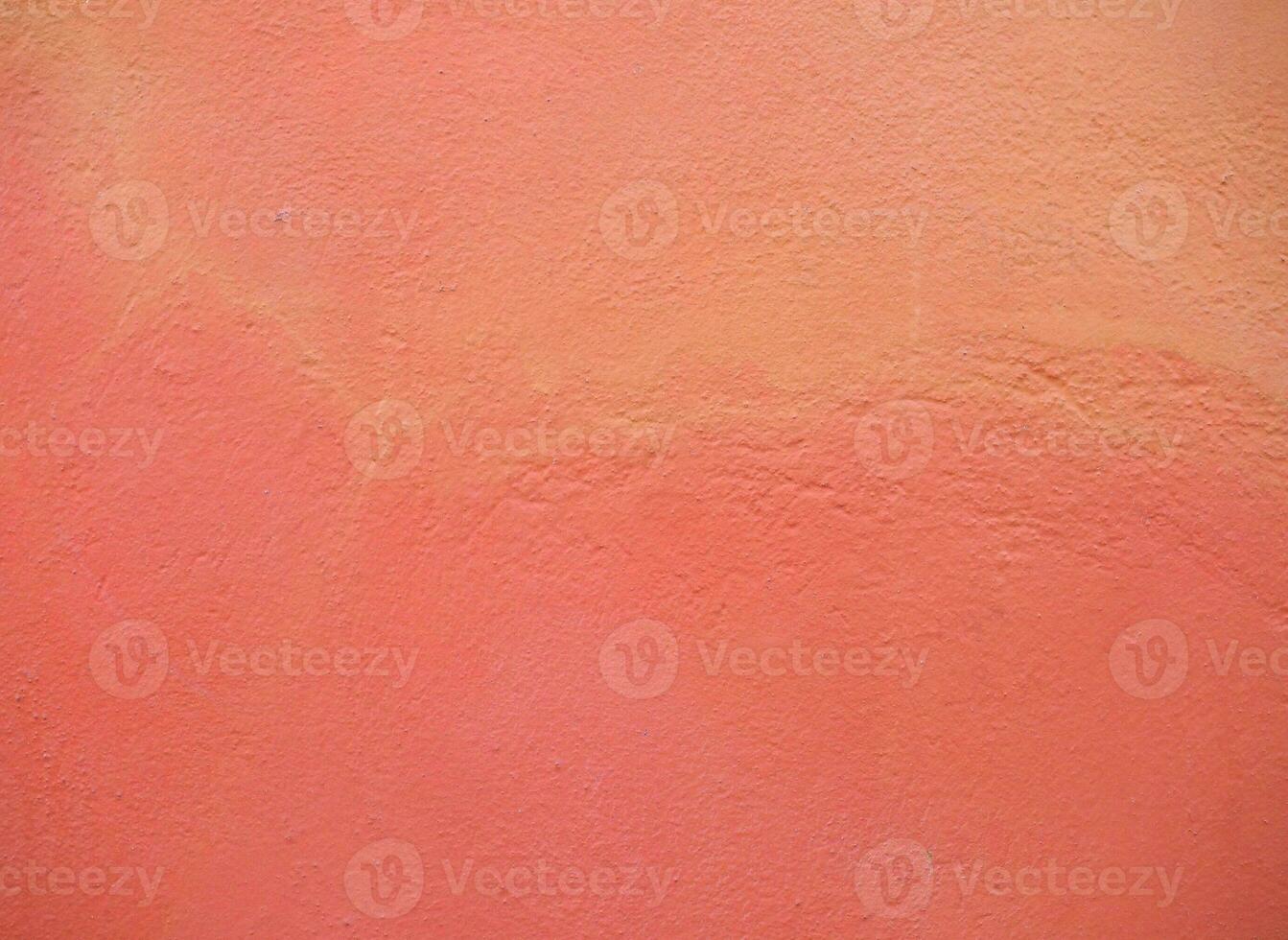 industriell stil orange målad plåster vägg foto
