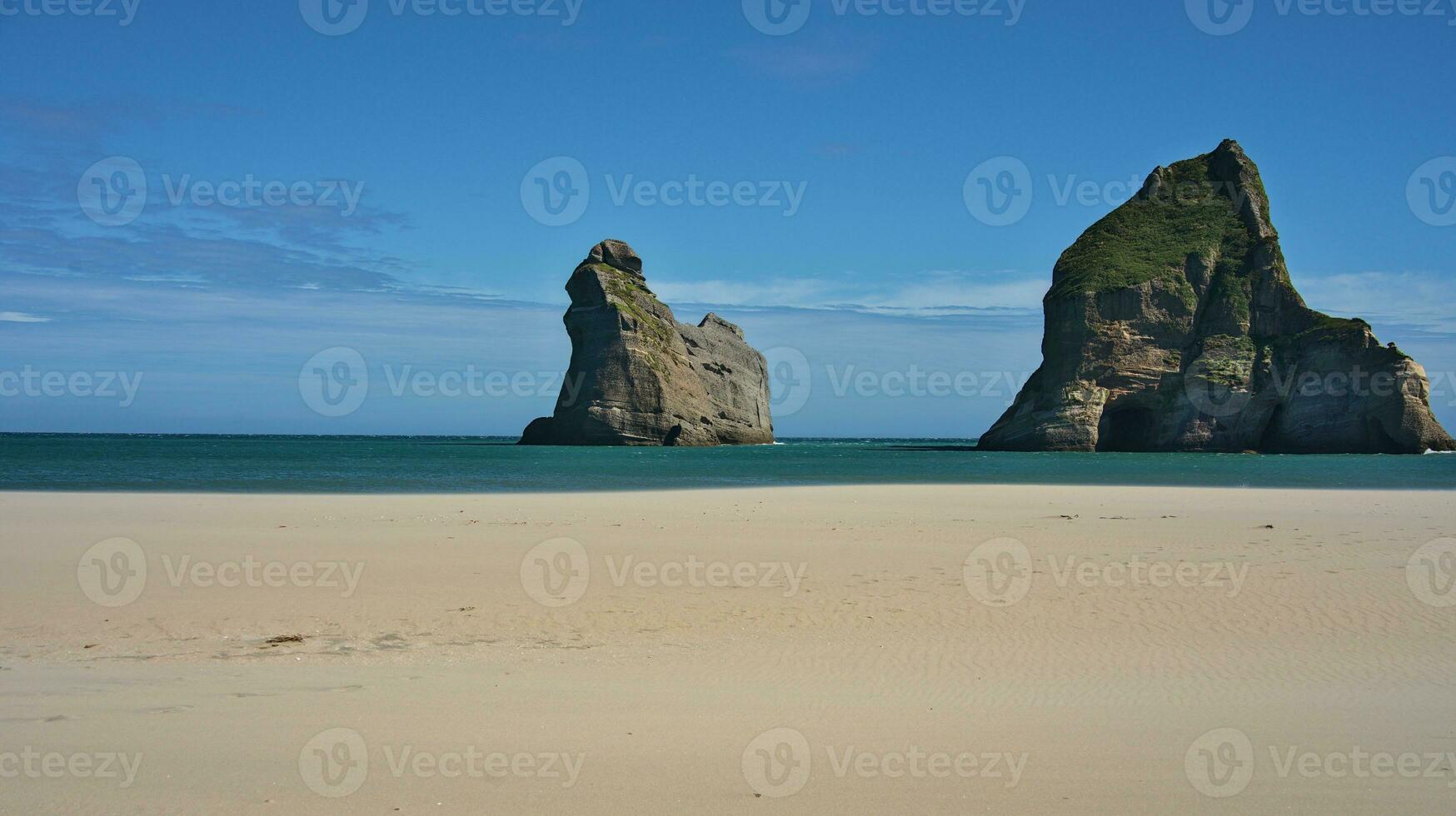 wharariki strand i sommar foto