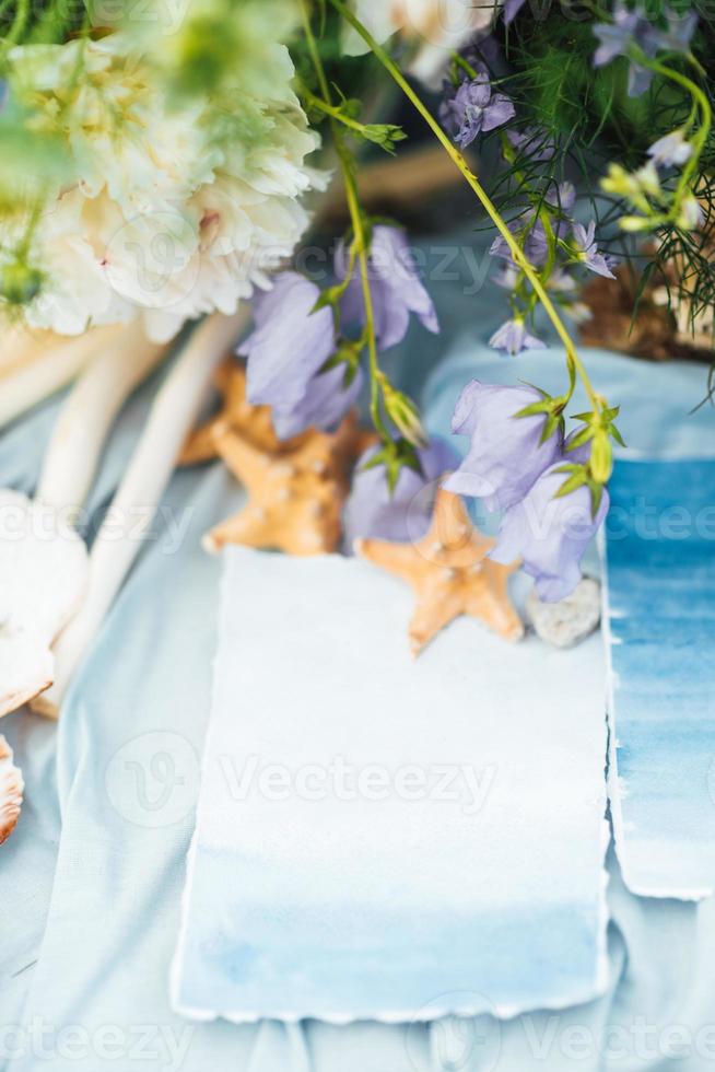 sjöstjärna och snäckskal bröllopsdekor foto