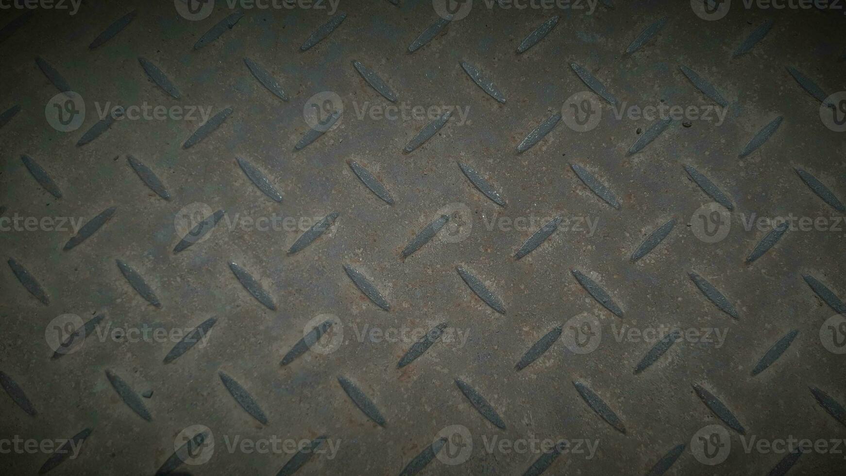 grunge metall textur. grunge stål golv tallrik bakgrund i vitage ljus. industriell vägg diamant stål mönster. diamant metall bakgrund foto