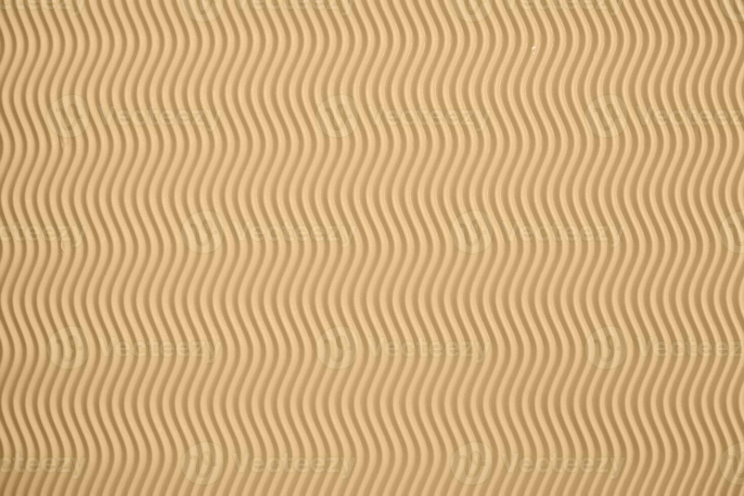 beige bakgrund med vågig textur. perfekt bakgrund för din design foto