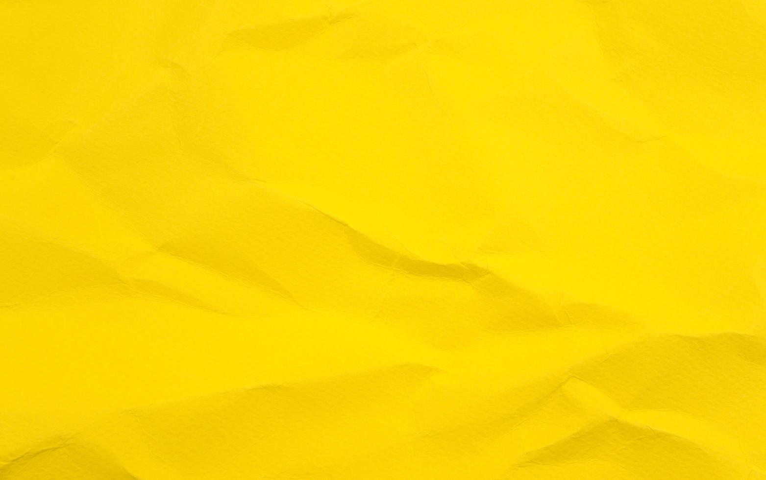 levande färgglada skrynkliga skrynkliga ringblomma ringblomma gul blankt papper textur abstrakt bakgrund foto