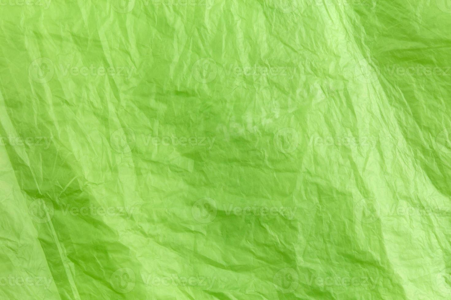 abstrakt konsistens av grön cellofanavfallspåse foto