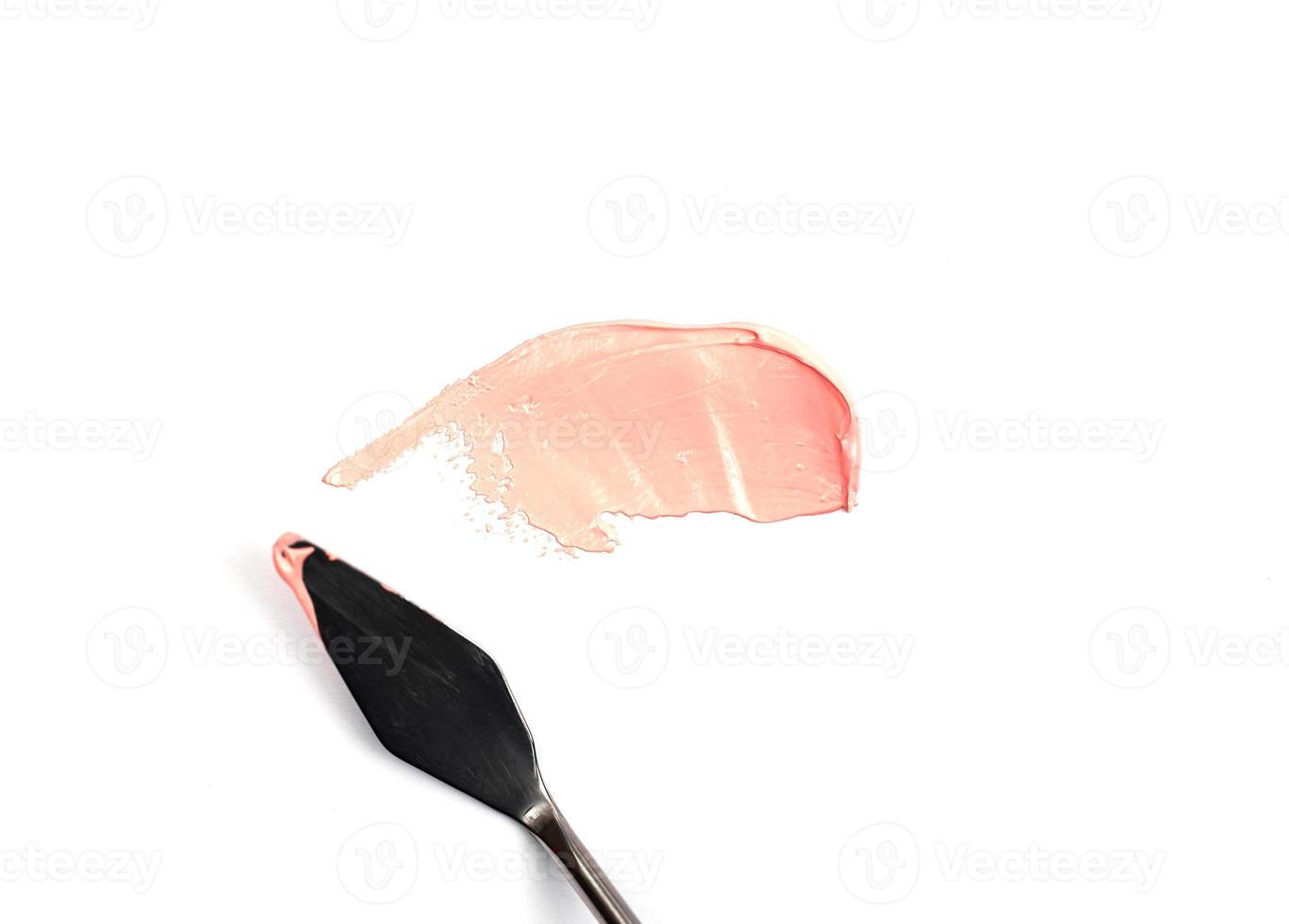 en målning palettkniv isolerad på en vit bakgrund med rosa foto