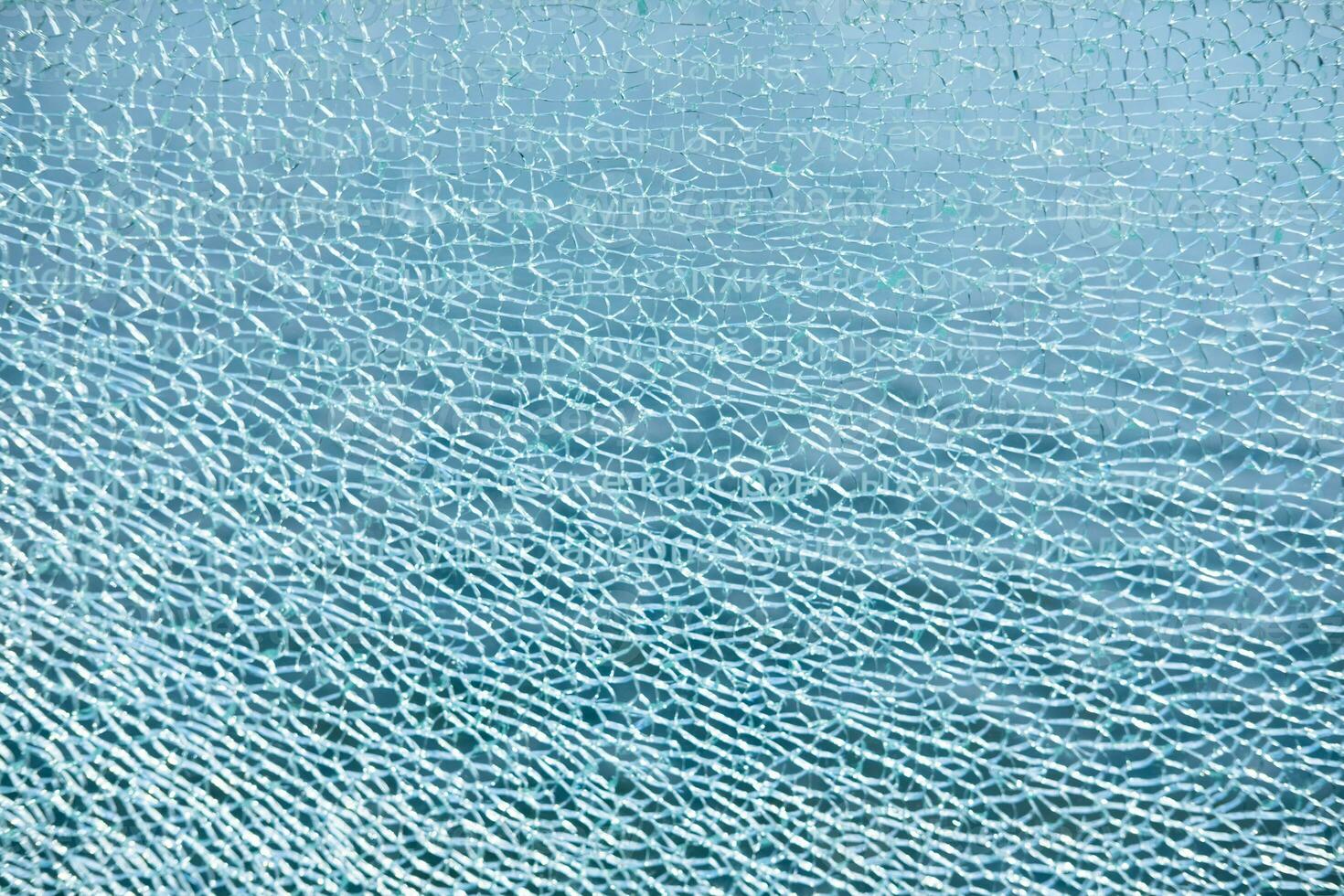 bakgrund och textur från fragment av bruten glas, blå Färg foto