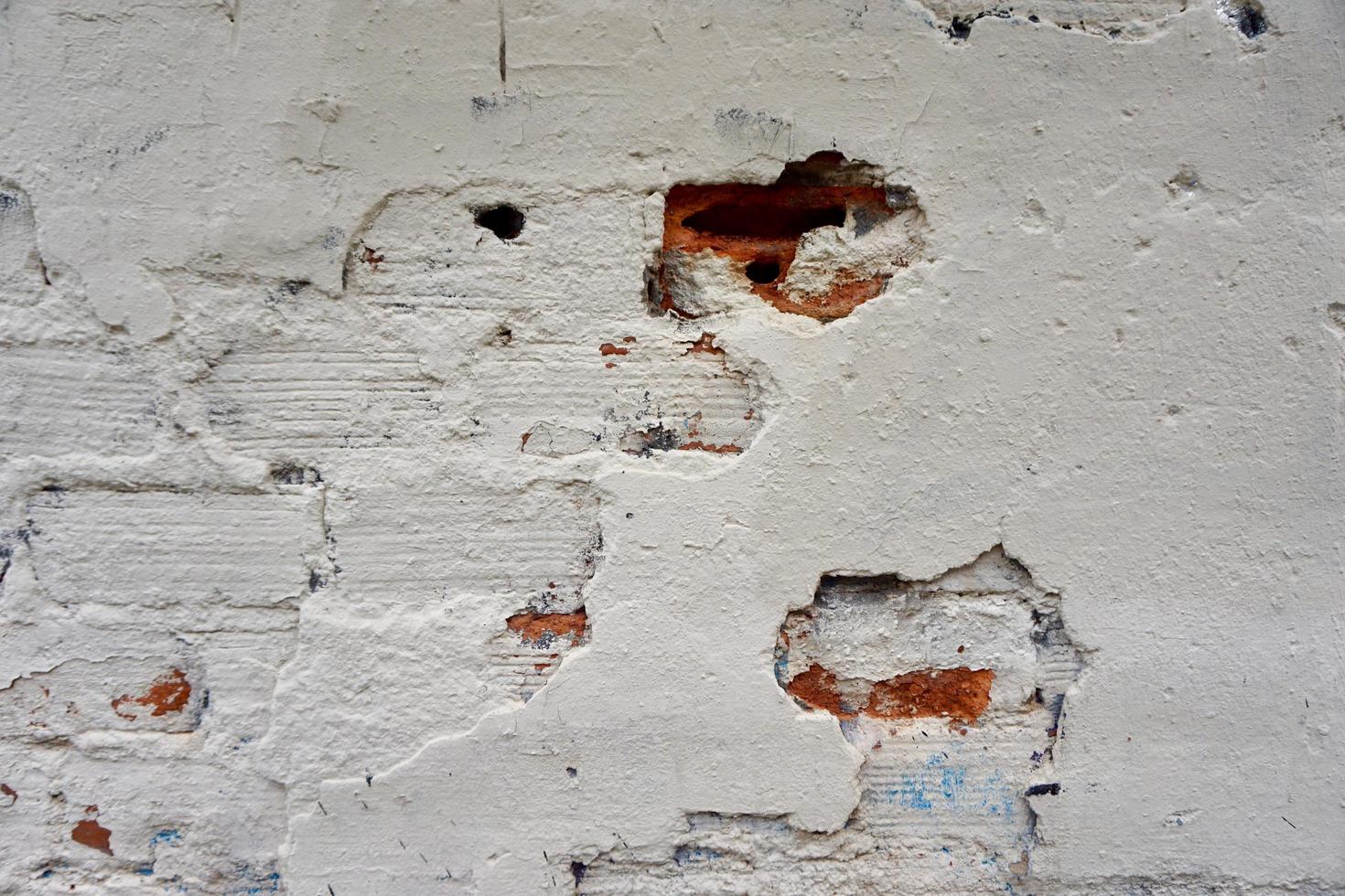vit gammal trasig vägg texturerad bakgrund foto