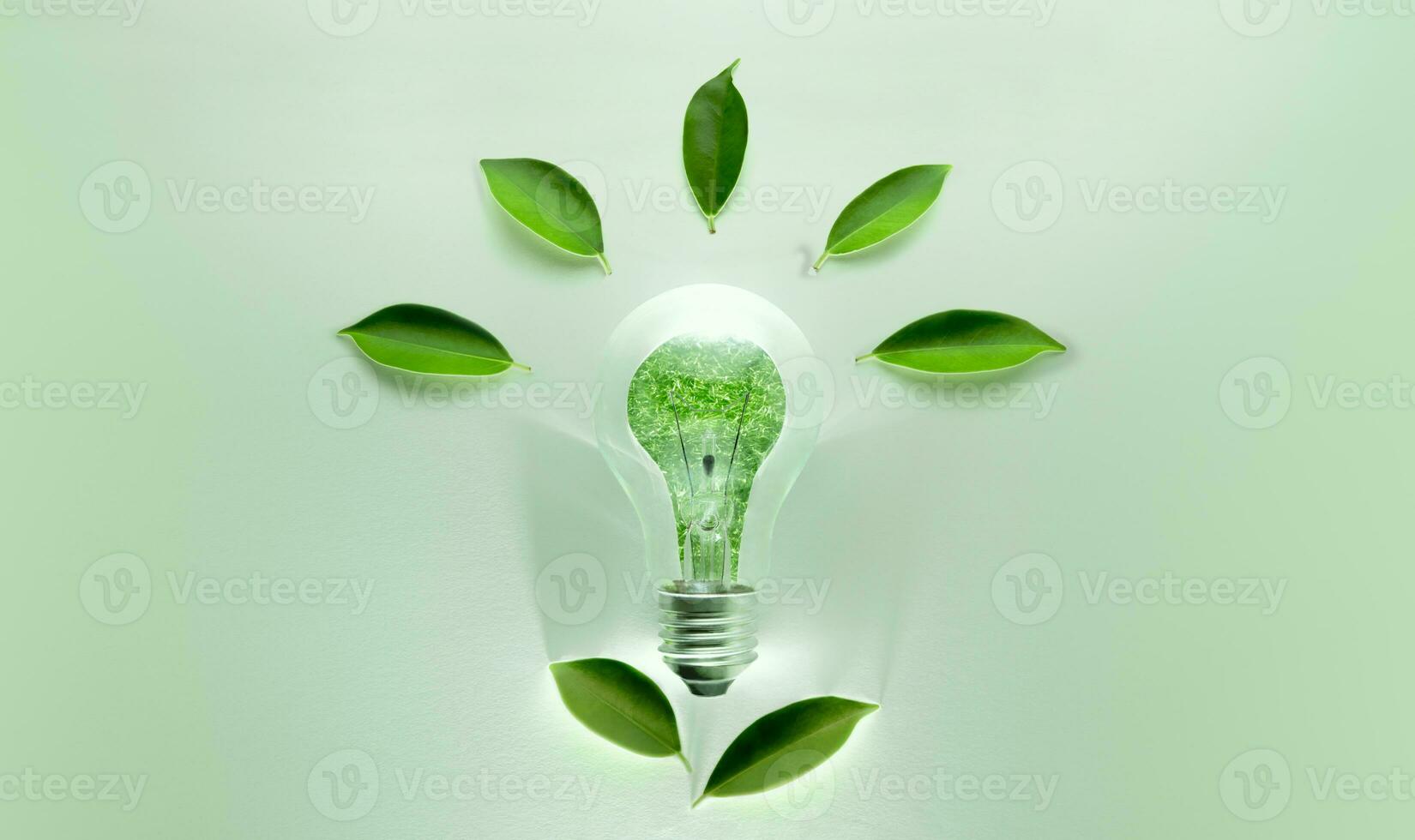 grön energi begrepp. trådlös ljus Glödlampa med grön blad form som tecken av lampor på. kol neutral och utsläpp t.ex för rena energi. hållbar Resurser, förnybar och miljö- vård foto