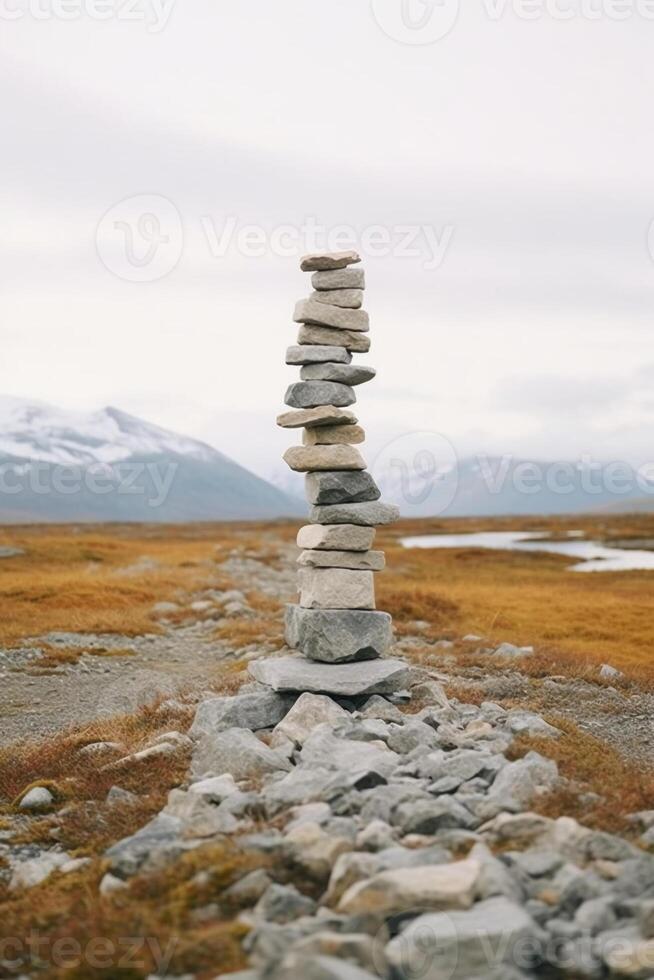 en minimalistisk inukshuk tillverkad av staplade stenar pekande de sätt tvärs över de alaskan tundra. ai generativ foto