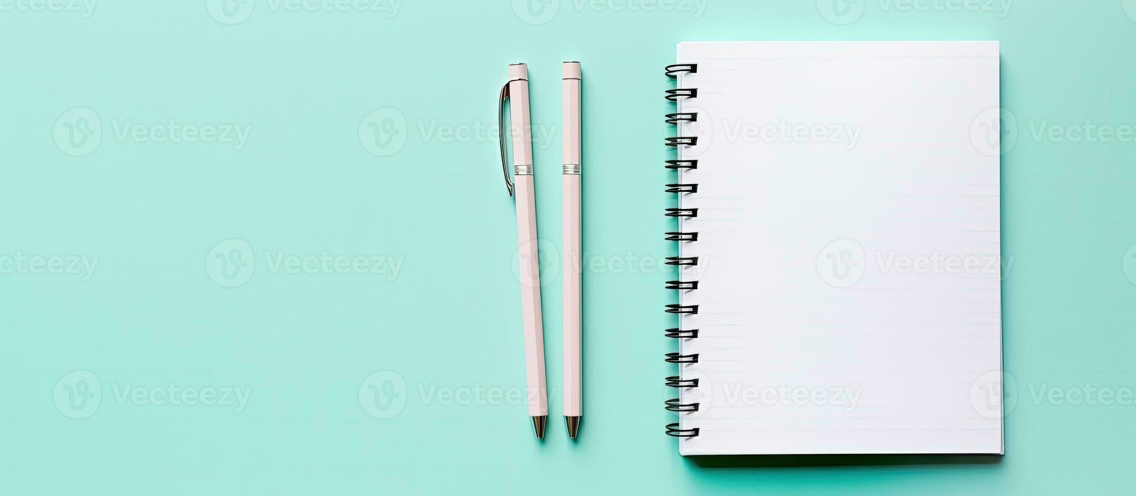 en anteckningsbok och penna på en blå bakgrund skapas med generativ ai teknologi foto