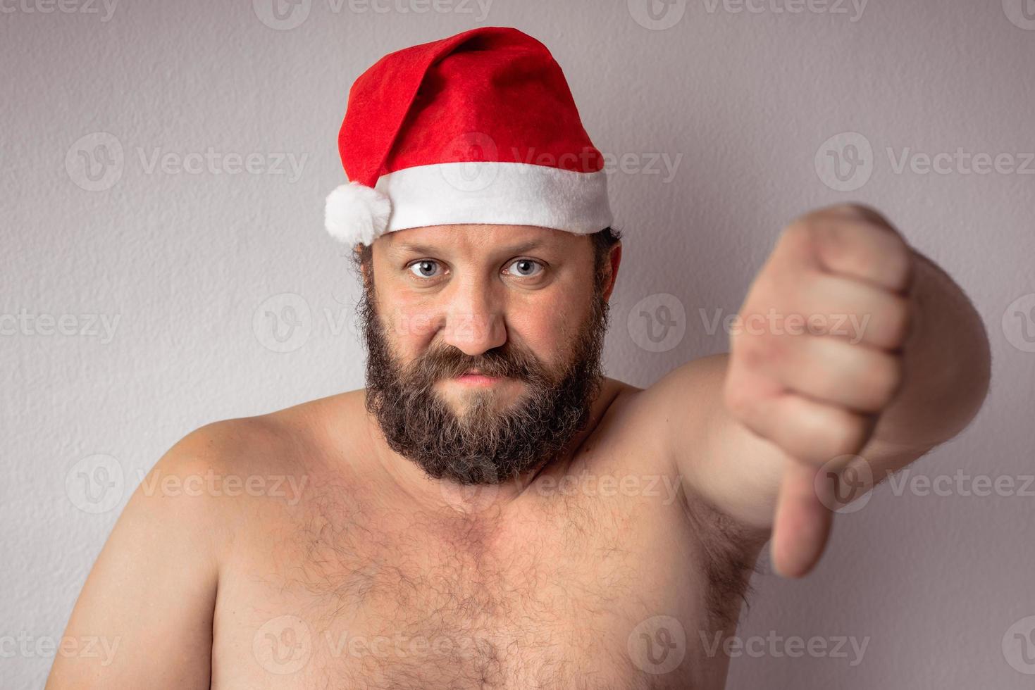 skäggig halvnaken jultomten man foto
