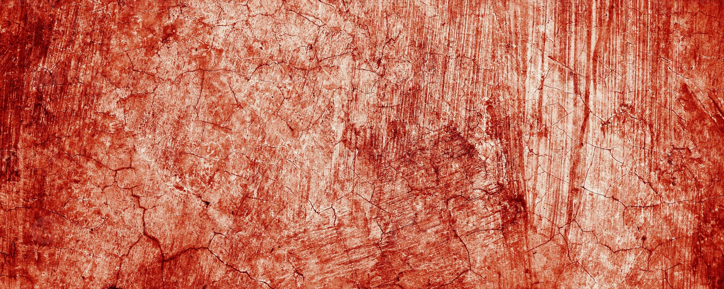 stänker av röd måla likna färsk blod, deras ojämn kanter bidrar till en känsla av oro. de fläckar, påminner av halloween fasor. foto