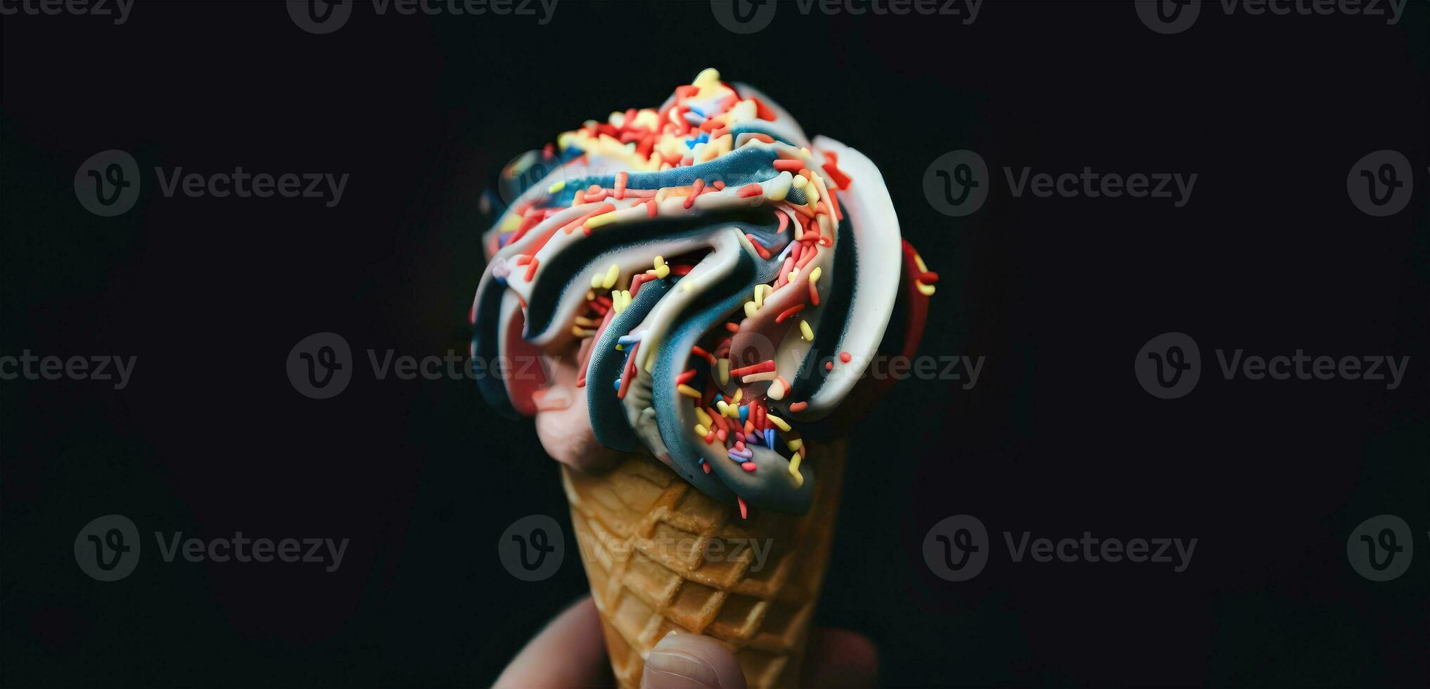 genertaiv ai, ai genererad, stänga upp en hand innehav en skopa av vibrerande färgrik smak is grädde på de våffla kon med strössel, mörk bakgrund, festlig firande foto