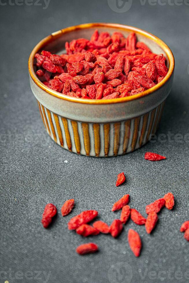 goji bär utsökt mat tillägg vegetabiliska mat friska måltid mat mellanmål på de tabell kopia Plats mat bakgrund rustik topp se foto