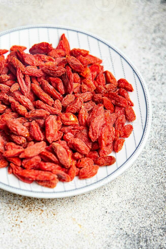 goji bär utsökt mat tillägg vegetabiliska mat friska måltid mat mellanmål på de tabell kopia Plats mat bakgrund rustik topp se foto