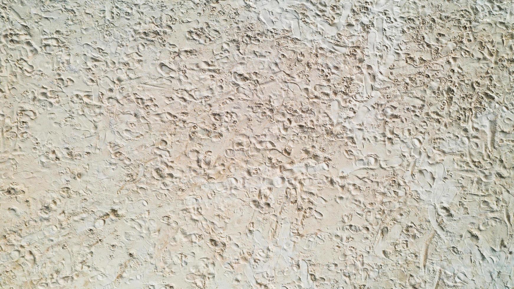 ytan på sandstrandbakgrunden foto