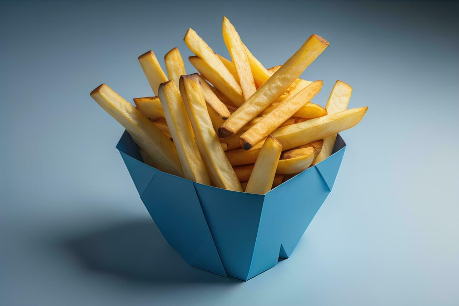 franska frites i en blå låda på en grå bakgrund. generativ ai foto