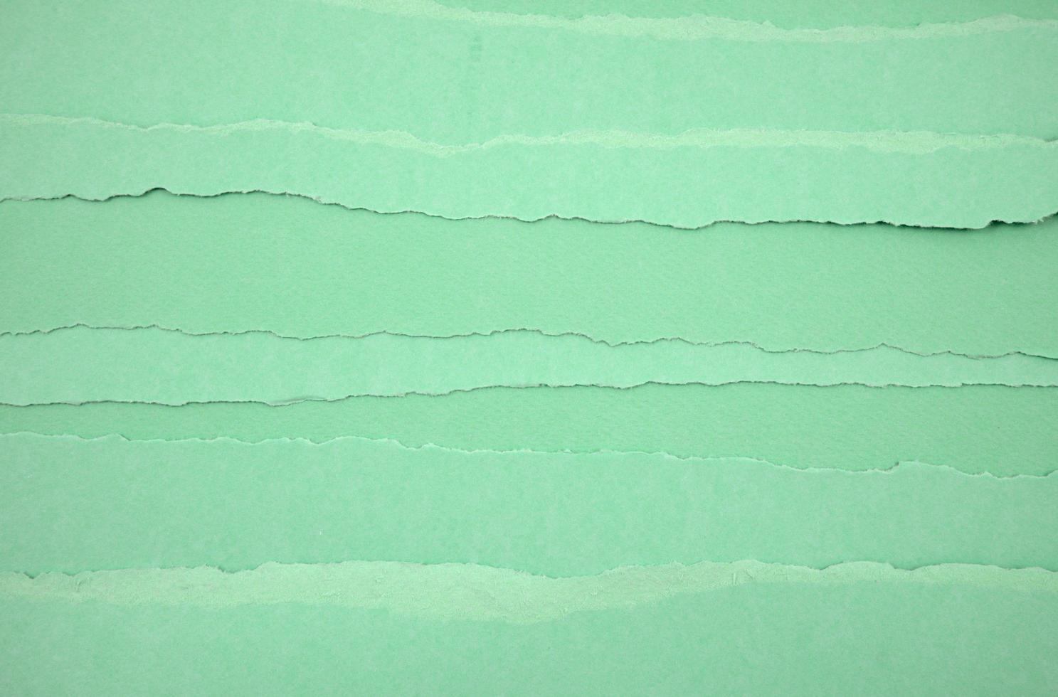 vintage neutrala sönderrivna gröna papper abstrakt textur bakgrund. foto