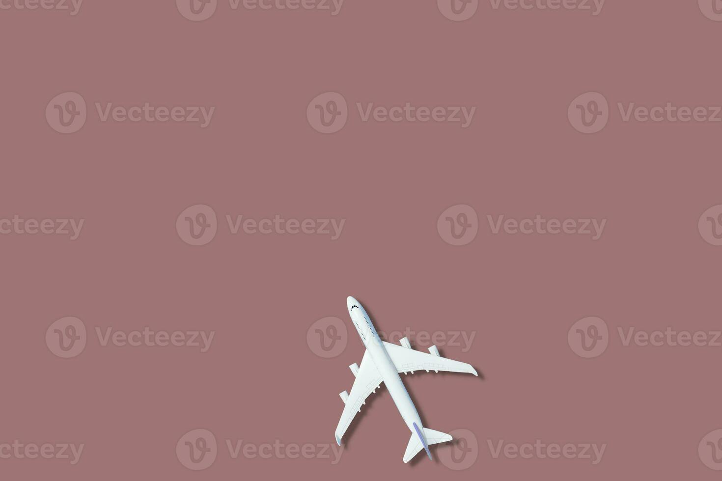 flygplan figur på rosa bakgrund foto