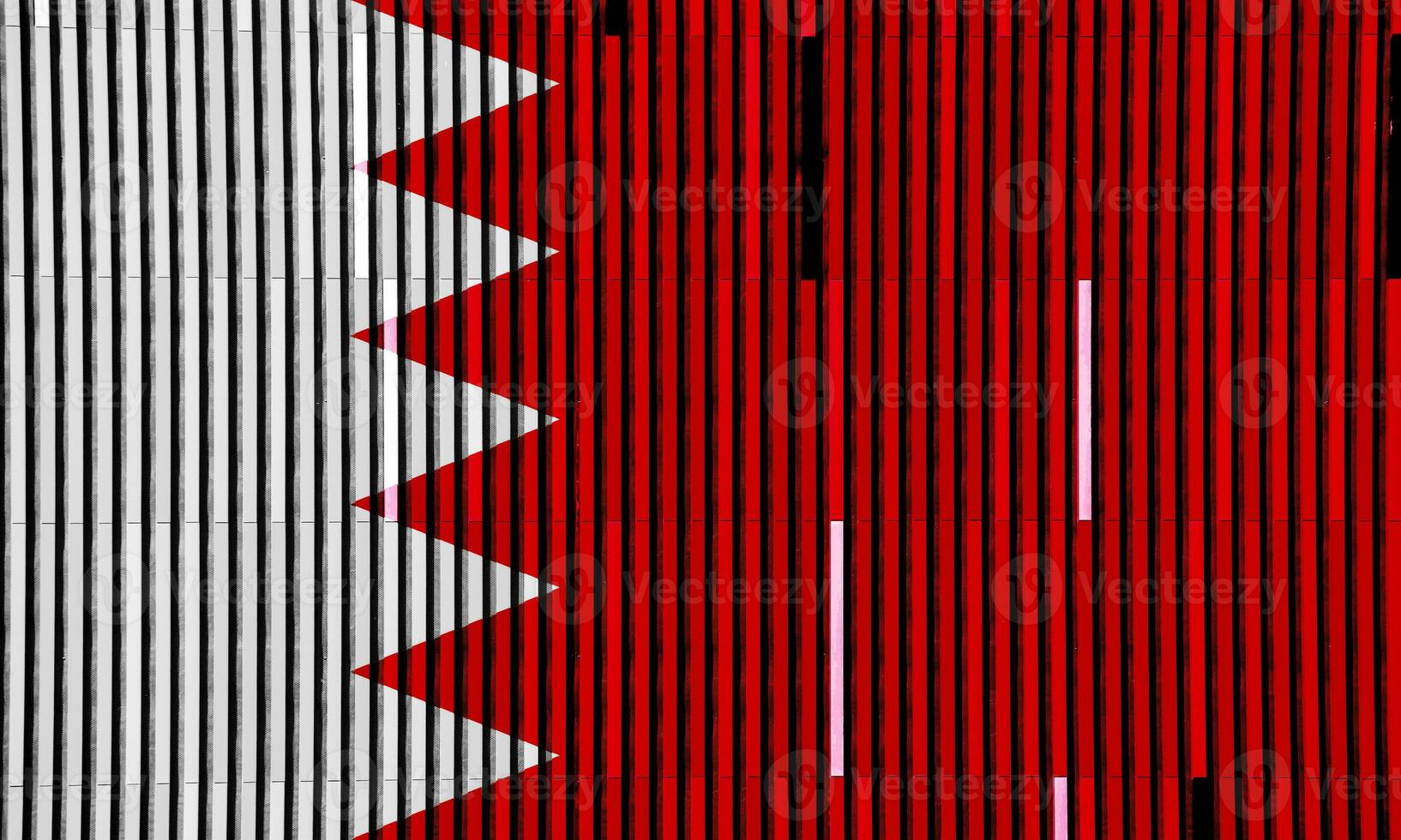 flagga av rike av bahrain på en texturerad bakgrund. begrepp collage. foto