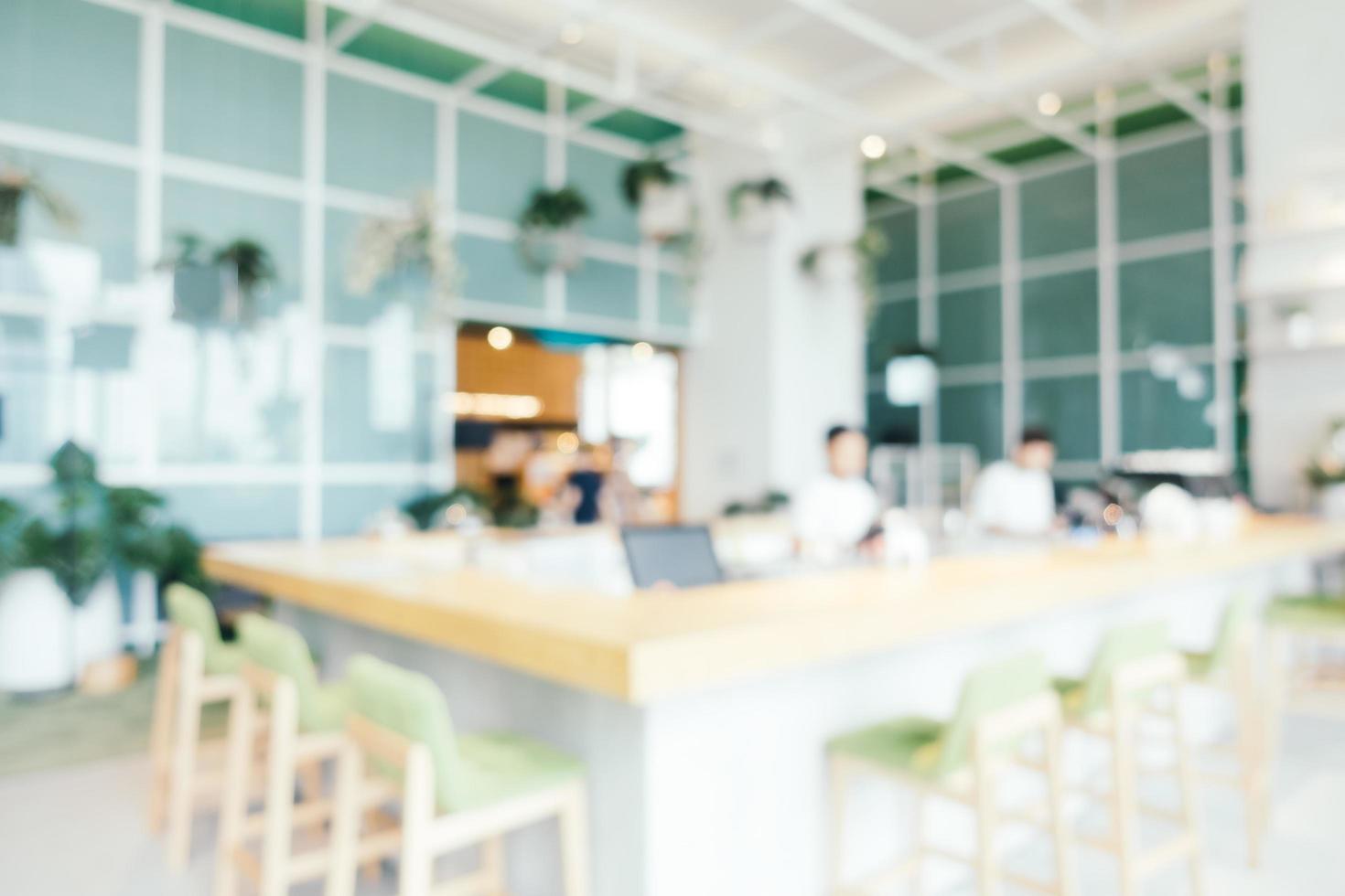 abstrakt oskärpa och defokuserat kafé och restauranginredning för bakgrund foto