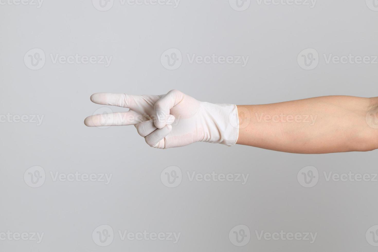 hand med medicinska handskar foto