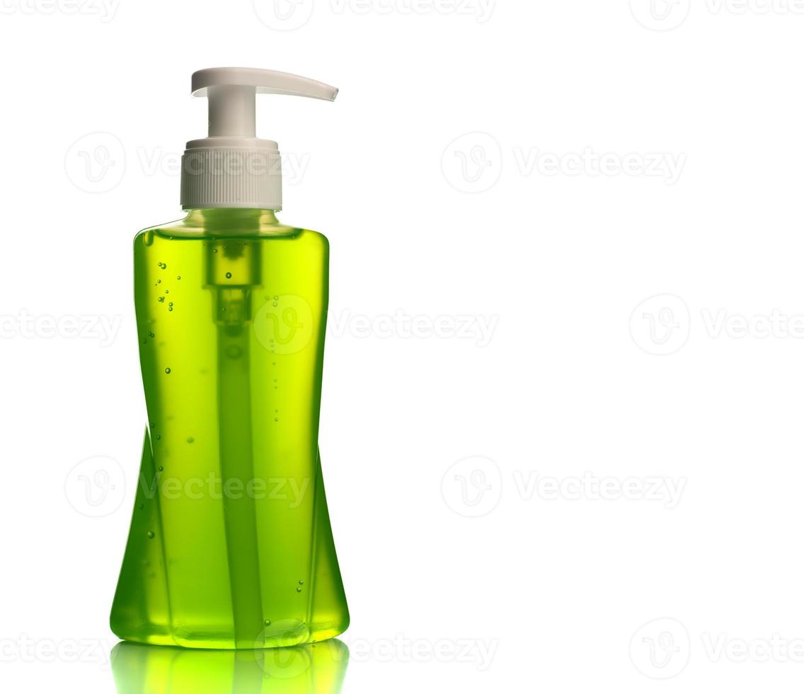 flaska flytande tvål eller grädde eller ansiktsdiskautomater eller flytande propp isolerad på vit bakgrund. foto