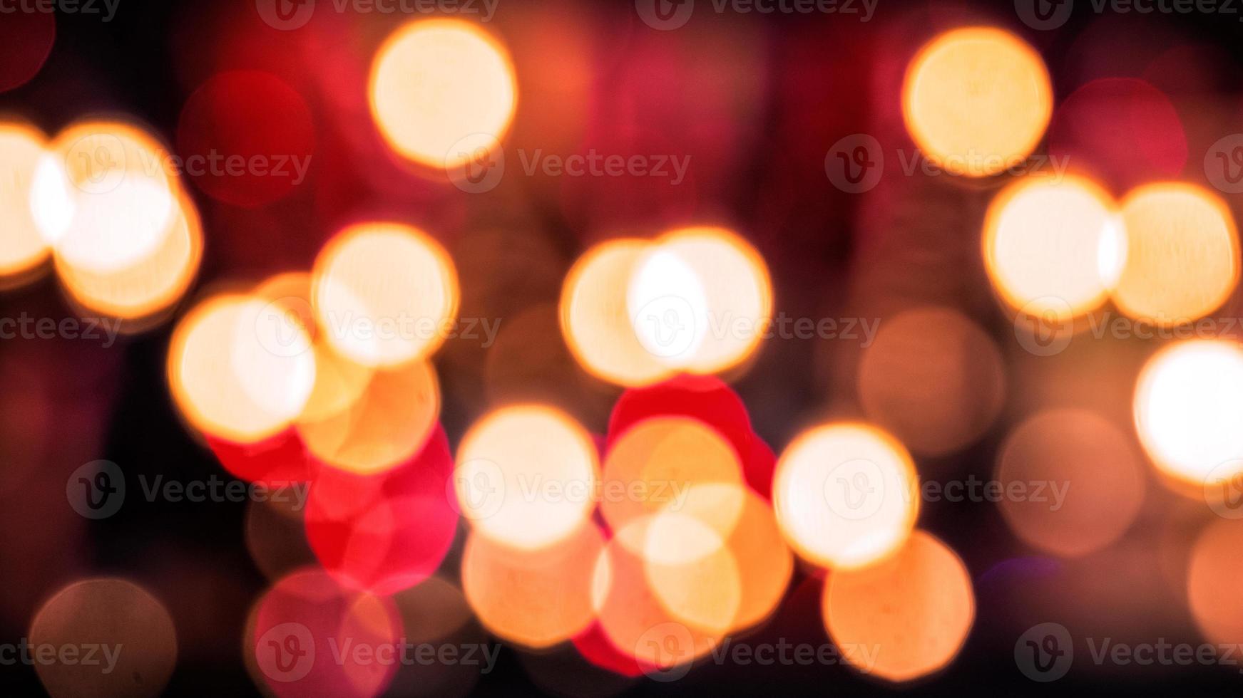 festlig jul bakgrund. abstrakt bakgrund med bokeh defokuserade ljus foto