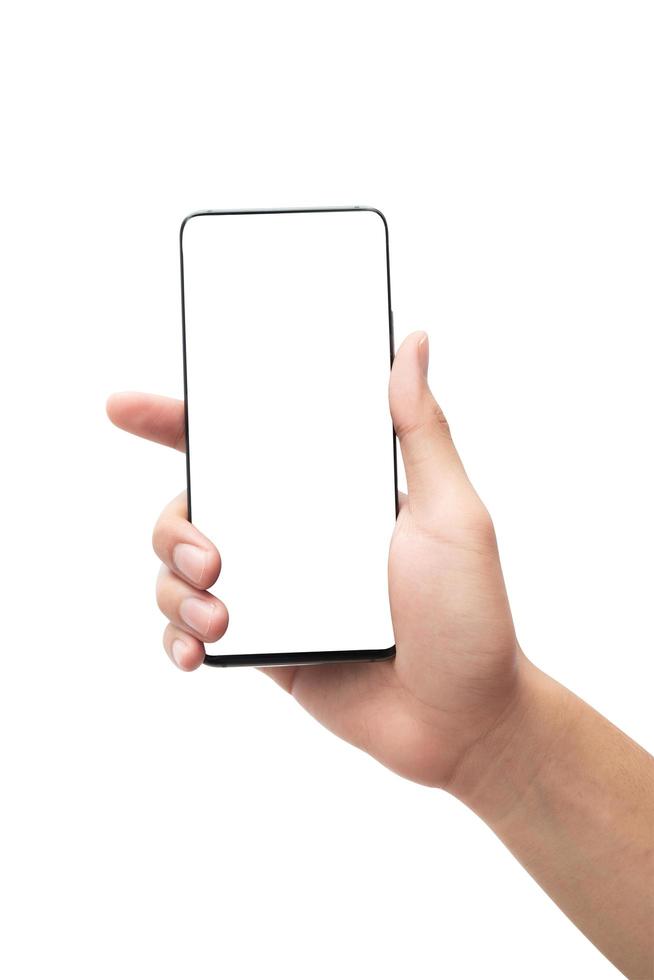 hand som håller smartphonen på vit bakgrund med urklippsbana foto