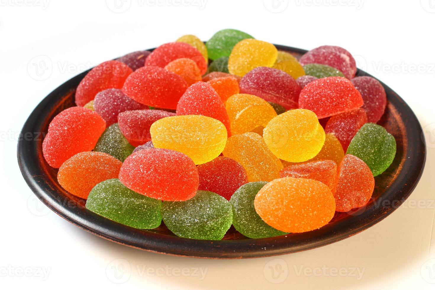 färgade sötsaker gelé godis i en tallrik foto