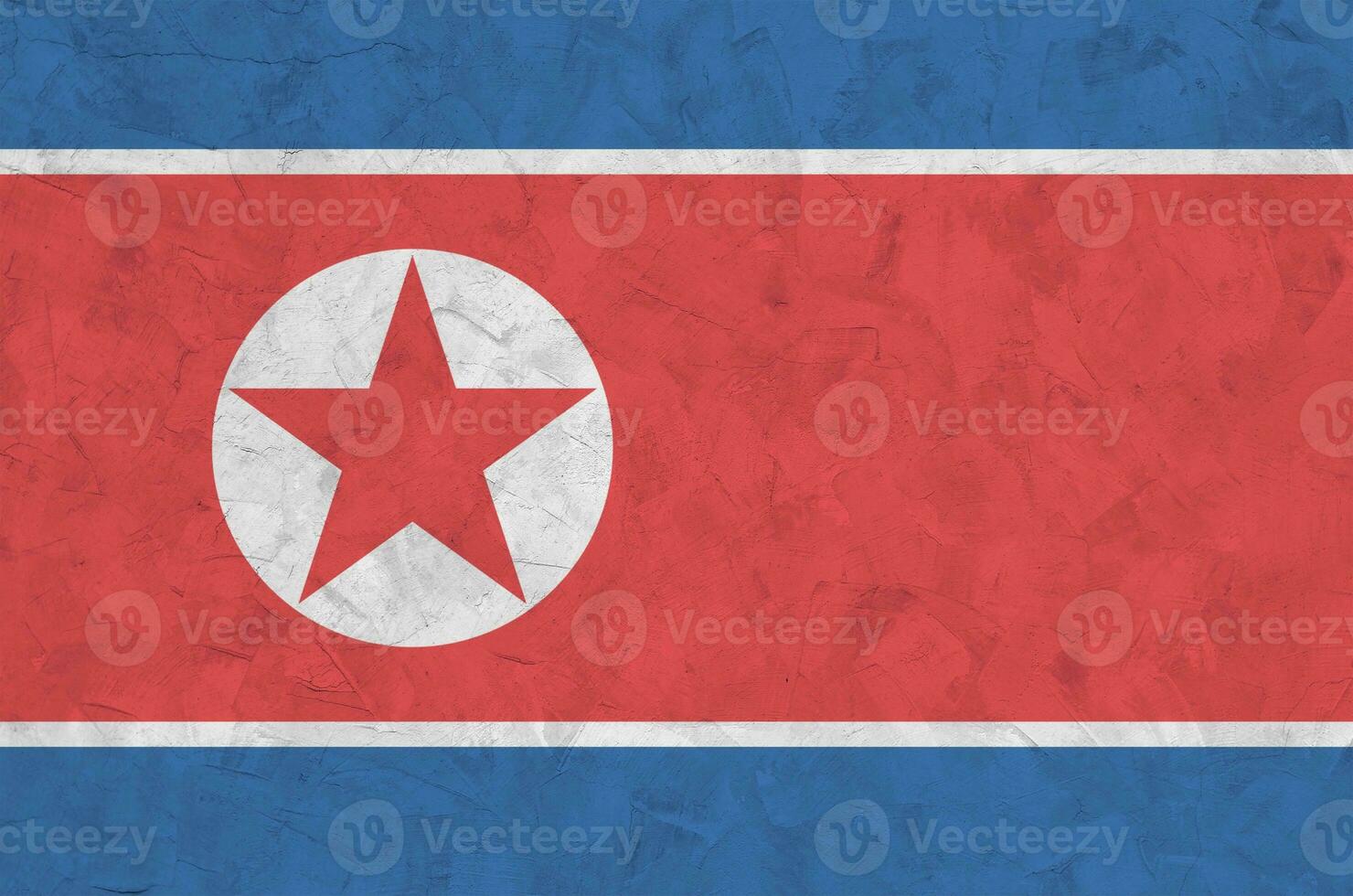 norr korea flagga avbildad i ljus måla färger på gammal lättnad putsning vägg. texturerad baner på grov bakgrund foto