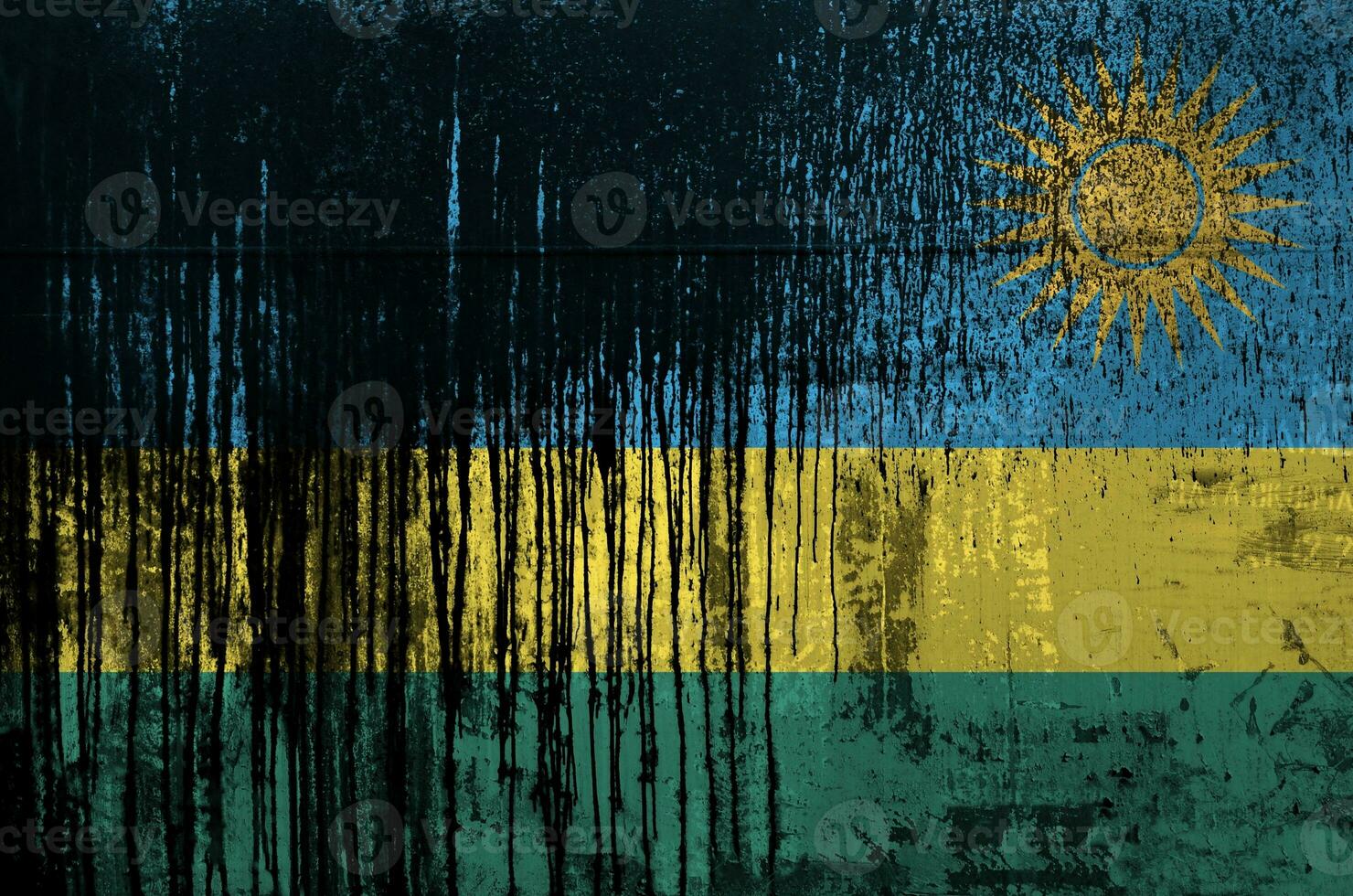 rwanda flagga avbildad i måla färger på gammal och smutsig olja tunna vägg närbild. texturerad baner på grov bakgrund foto