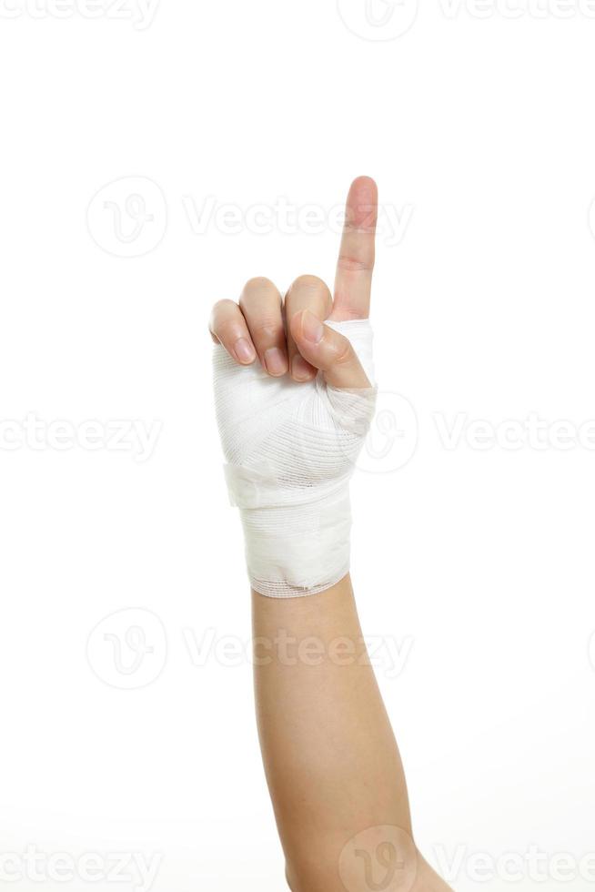 hand med bandage foto