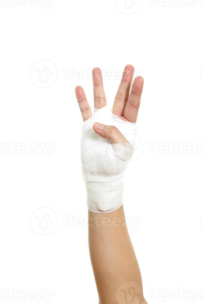 hand med bandage foto