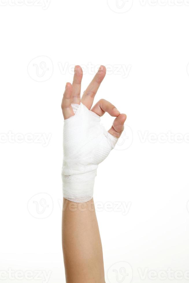 hand med bandage foto