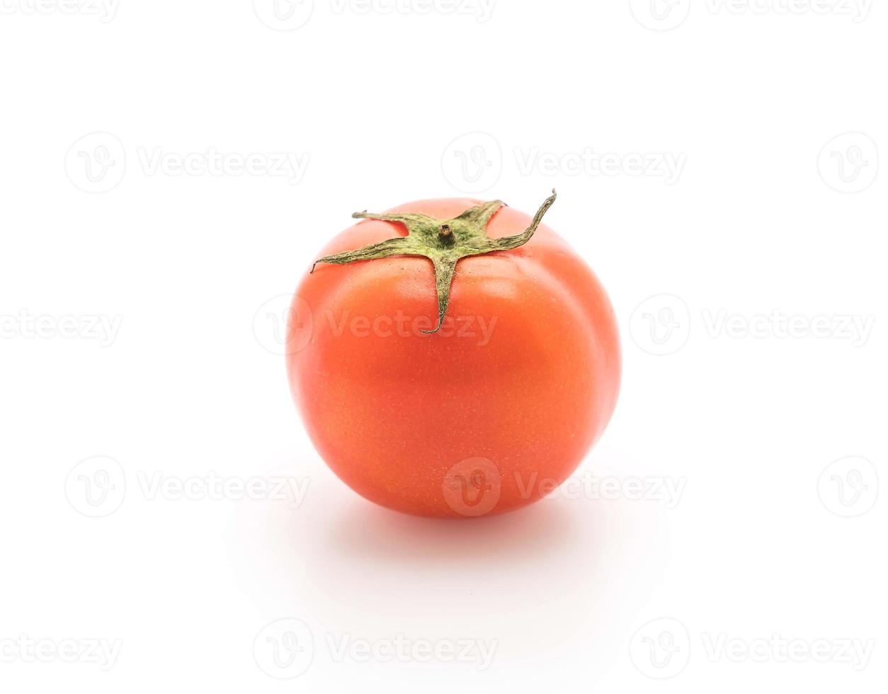färska tomater på vit bakgrund foto