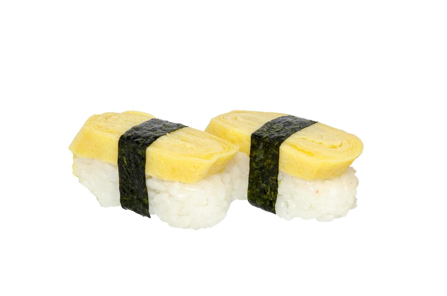 tamago sushi vit bakgrund foto