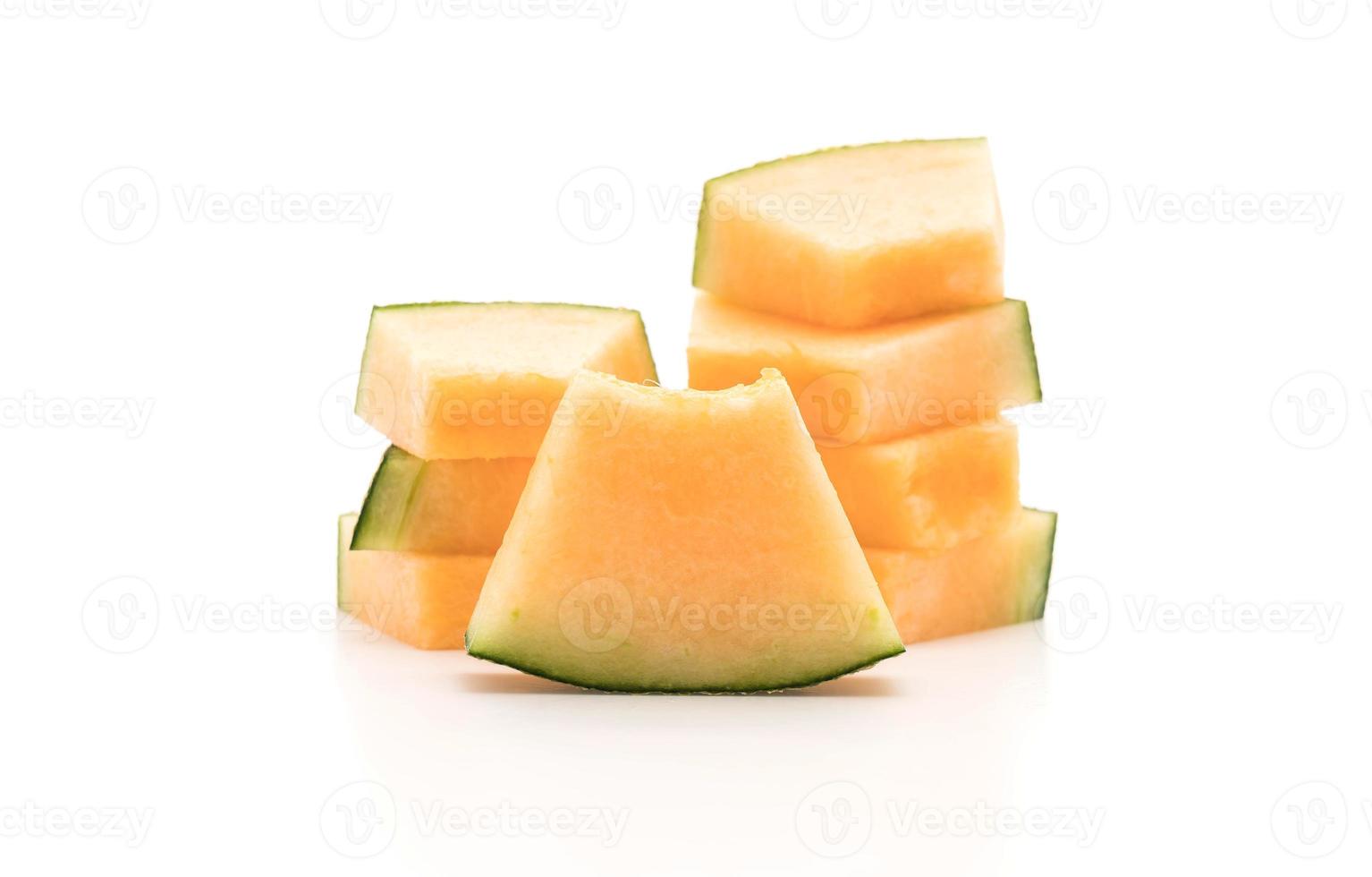 cantaloupmelon på vit bakgrund foto