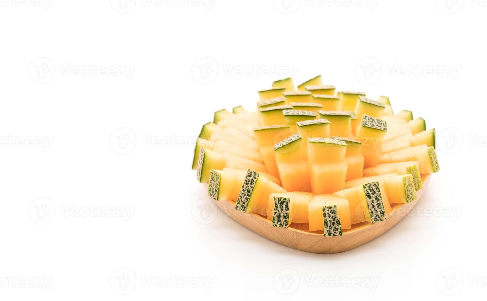 cantaloupmelon på vit bakgrund foto