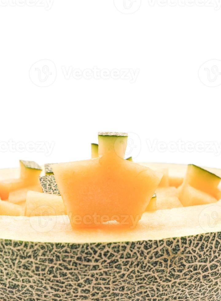 cantaloupmelon på vit bakgrund foto