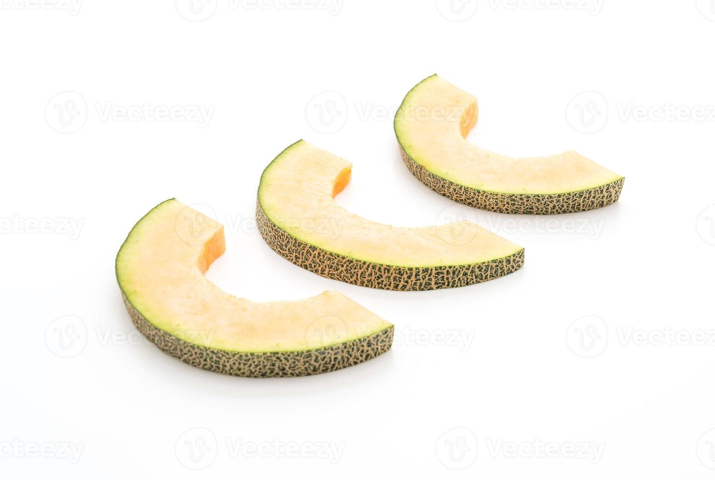 cantaloupmelon på vit bakgrund foto