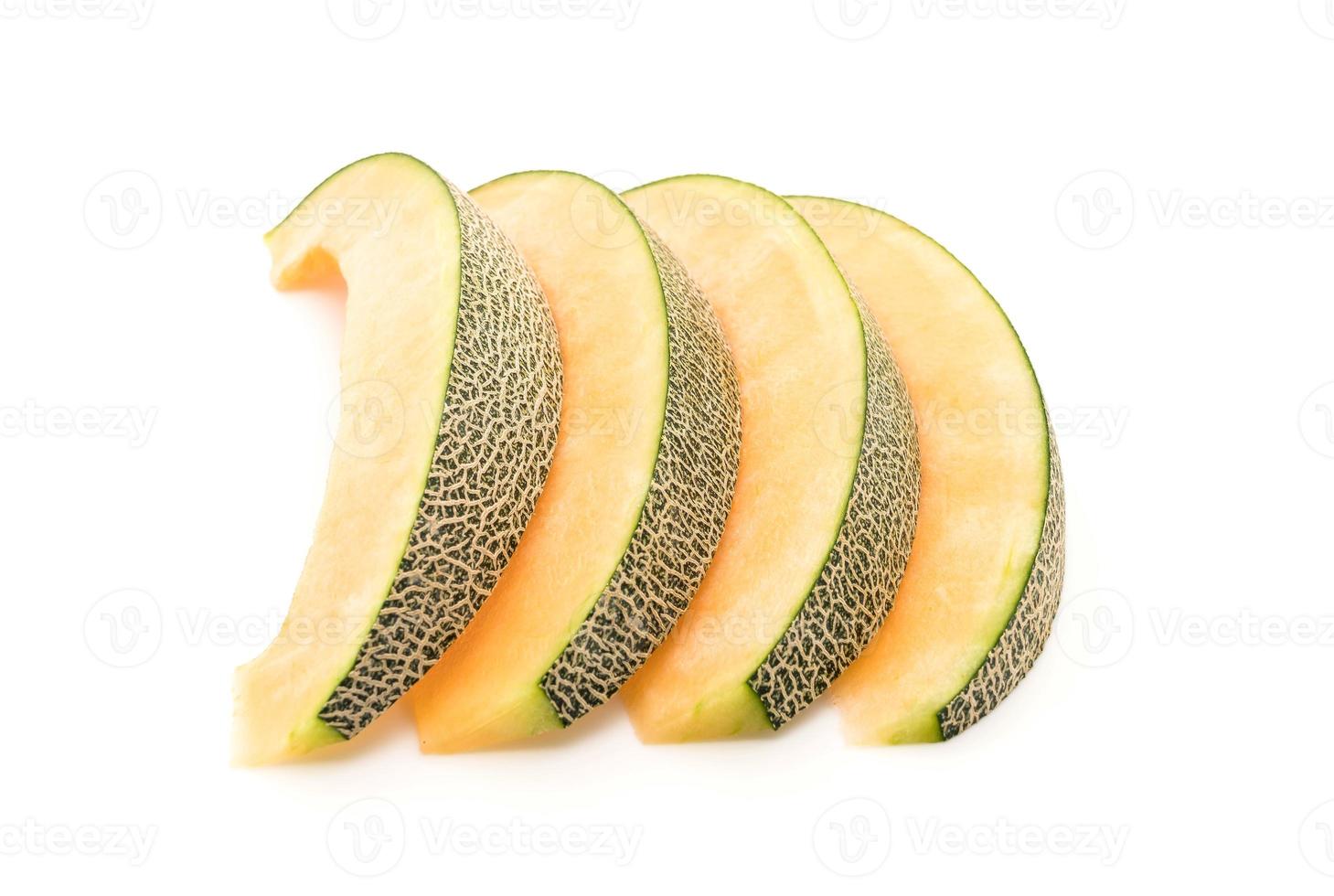 cantaloupmelon på vit bakgrund foto