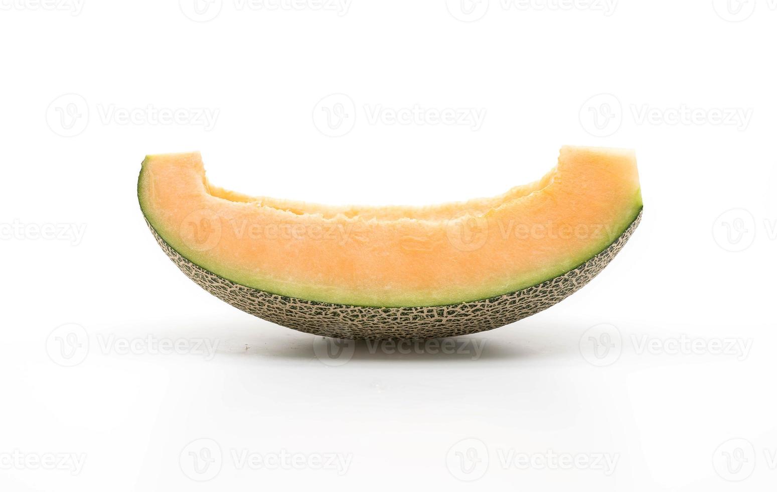 cantaloupmelon på vit bakgrund foto